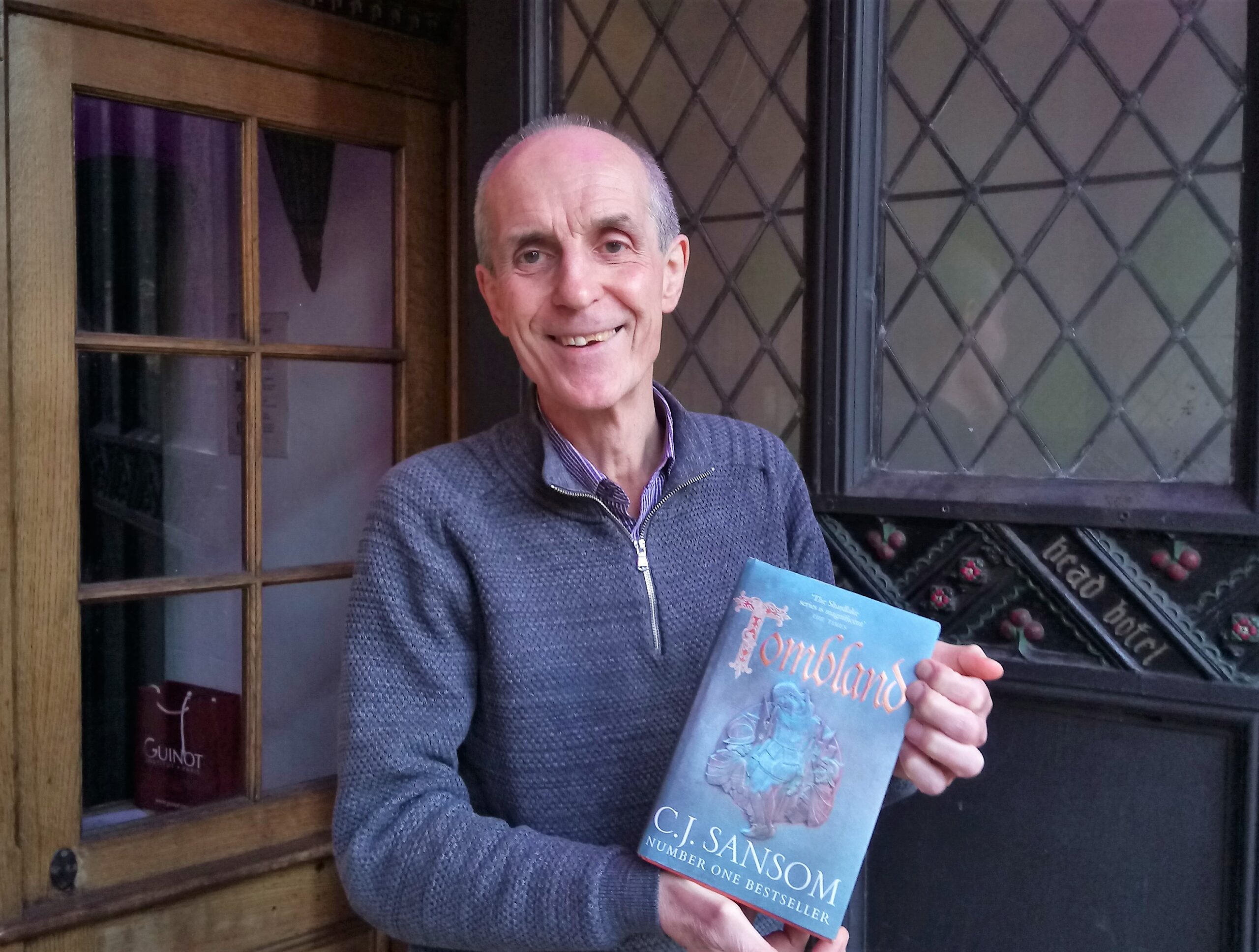 A man holding a book 